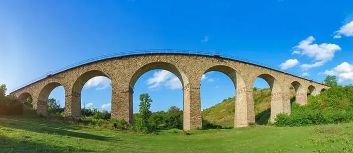Framed Print : Stone railway ancient arch bridge over green valley Framed Print : Stone railway ancient arch bridge over green valley