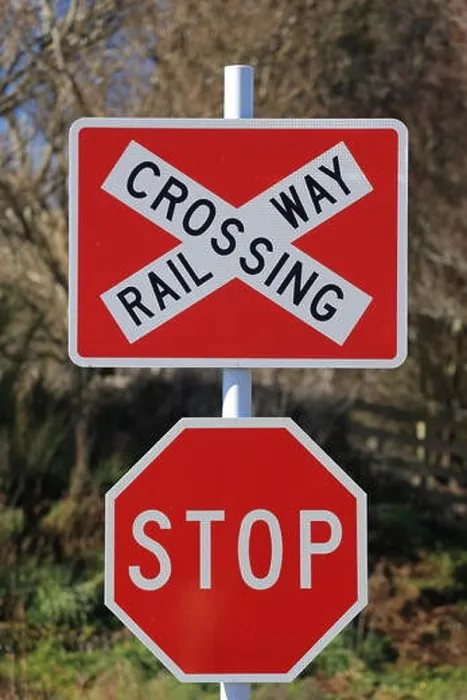 Framed Print : Stop sign at railway crossing