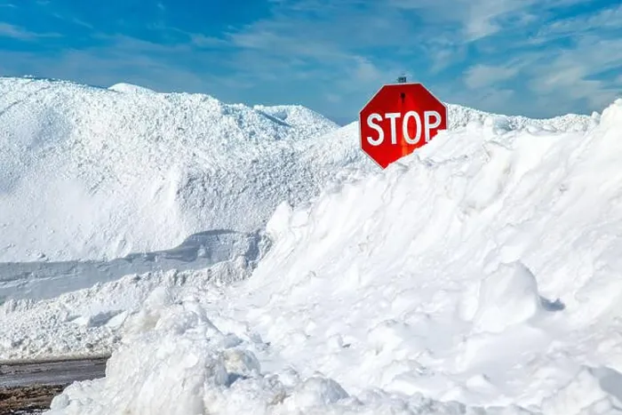 Framed Print : Stop sign in a snowbank Framed Print : Stop sign in a snowbank