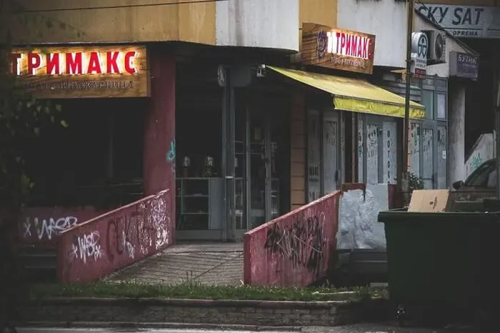 Framed Print : Store named trimaks with a neon advertisement and a dumpster in front all in a dim, creepy and scary environment Framed Print : Store named trimaks with a neon advertisement and a dumpster in front all in a dim, creepy and scary environment