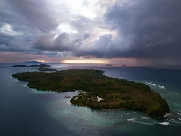 Framed Print : Storm clouds dump rain near a remote tropical island in the Solomon Islands. This beautiful country is home to spectacular marine biodiversity Framed Print : Storm clouds dump rain near a remote tropical island in the Solomon Islands. This beautiful country is home to spectacular marine biodiversity