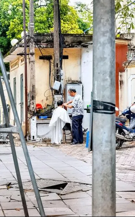 Framed Print : Street barber Hanoi Old Quarter Vietnam Framed Print : Street barber Hanoi Old Quarter Vietnam