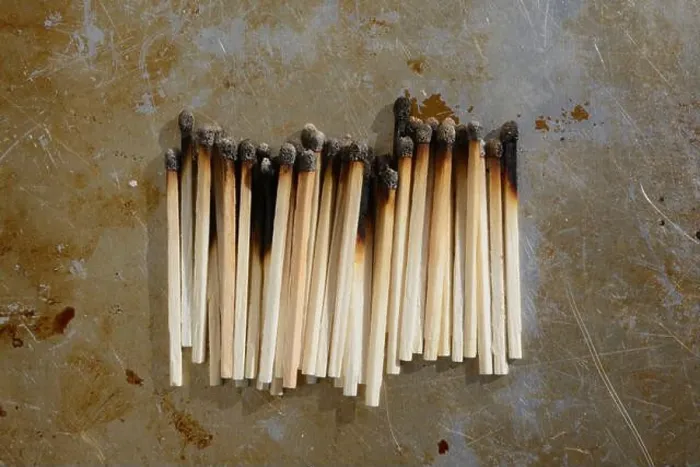 Framed Print : Studio shot of row of burned matches Framed Print : Studio shot of row of burned matches