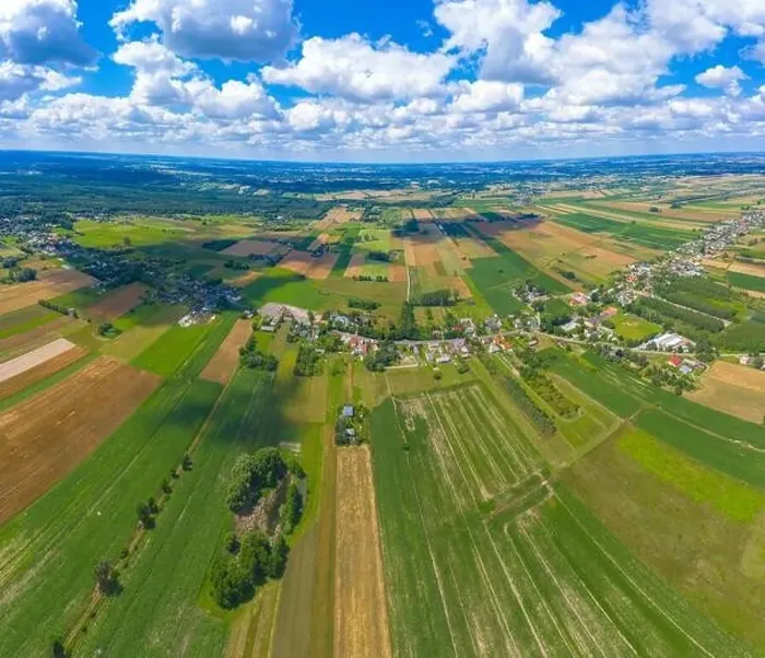 Framed Print : Stunning aerial panorama from a drone of countryside, village, green fields and trees, agriculture concept Framed Print : Stunning aerial panorama from a drone of countryside, village, green fields and trees, agriculture concept