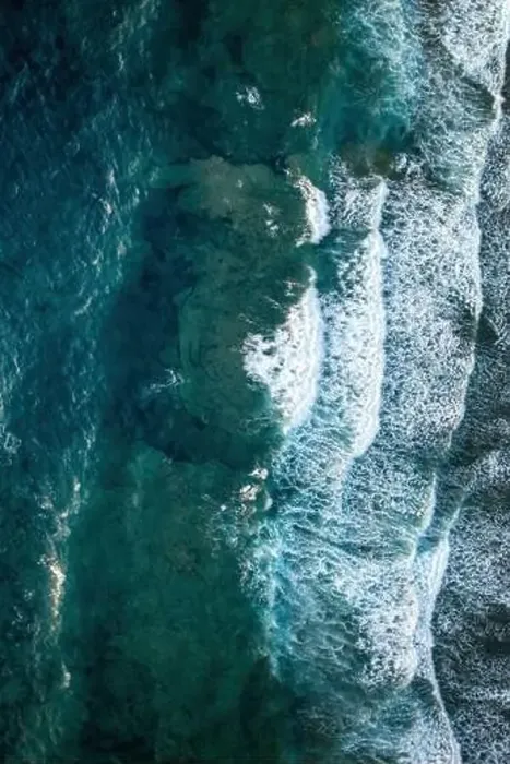Framed Print : A stunning aerial photo capturing the clear turquoise waters and gentle waves along the Sardinian coast Framed Print : A stunning aerial photo capturing the clear turquoise waters and gentle waves along the Sardinian coast