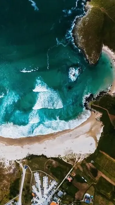 Framed Print : A stunning drone shot capturing the dynamic interface between the turquoise ocean waves Framed Print : A stunning drone shot capturing the dynamic interface between the turquoise ocean waves