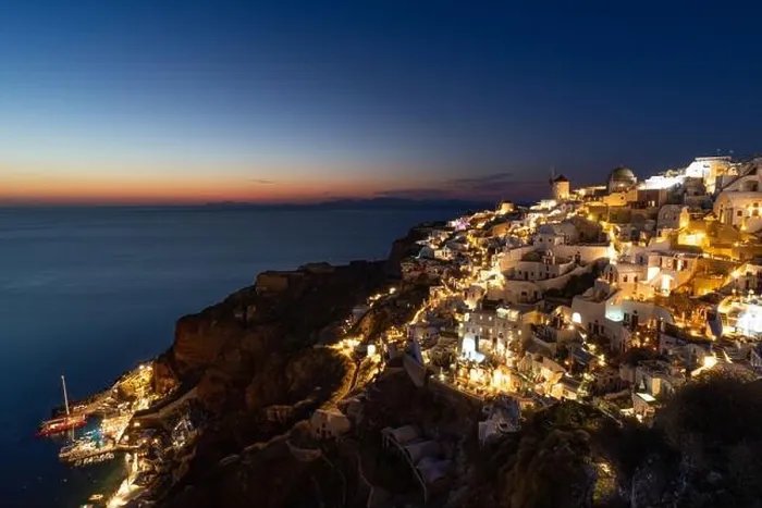 Framed Print : Stunning night view of fabulous caldera view, picturesque village of Oia with traditional white houses under sunset. Amazing travel vacation landscape Framed Print : Stunning night view of fabulous caldera view, picturesque village of Oia with traditional white houses under sunset. Amazing travel vacation landscape