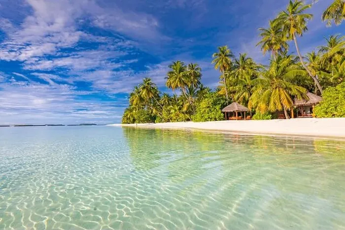 Framed Print : Stunning tourism landscape. Luxurious beach resort, palm trees over calm sea water, beach villas and blue sky. Romantic destination, vacation, holiday Framed Print : Stunning tourism landscape. Luxurious beach resort, palm trees over calm sea water, beach villas and blue sky. Romantic destination, vacation, holiday