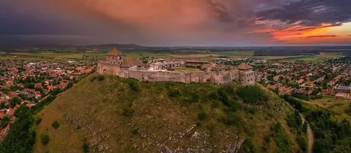 Framed Print : Sumeg, Hungary - Aerial panoramic view of the famous High Castle of Sumeg in Veszprem county at sunset with storm Framed Print : Sumeg, Hungary - Aerial panoramic view of the famous High Castle of Sumeg in Veszprem county at sunset with storm