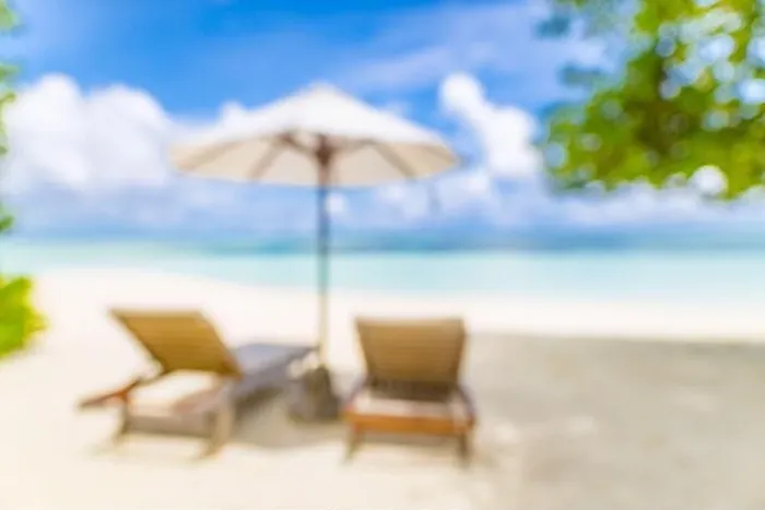 Framed Print : Summer exotic sandy beach with blur palms and sea on background