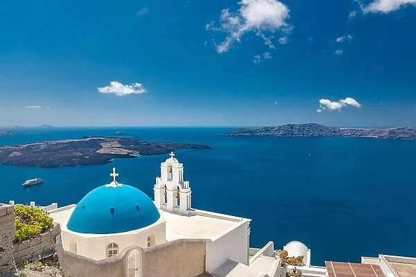 Summer island view in summer landscape. Thira town in Santorini island and the sea, Greek landscape cityscape. Blue dome over amazing blue sea view