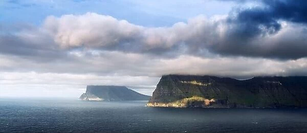 Summer islands in Atlantic ocean from Kalsoy island, Faroe Islands, Denmark. Landscape photography