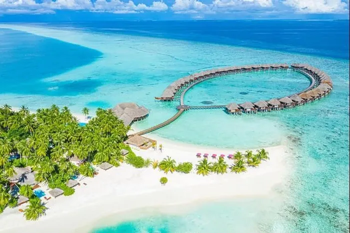 Framed Print : Summer landscape and seascape as aerial tropical background. Amazing view from above, luxury water bungalows, vacation holiday mood. Pristine clear