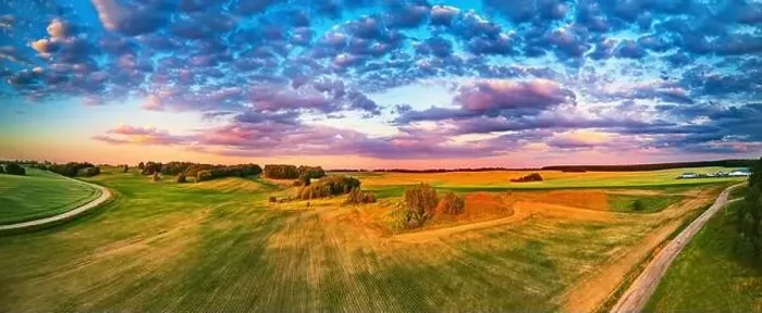 Framed Print : Summer rural sunset aerial panorama. Wheat agricultural fields on hills. Road to village, Belarus Framed Print : Summer rural sunset aerial panorama. Wheat agricultural fields on hills. Road to village, Belarus