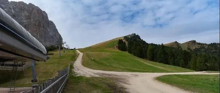 Framed Print : Summer ski resort. Dolomites in European Alps. Shot in summer with green grass and no snow Framed Print : Summer ski resort. Dolomites in European Alps. Shot in summer with green grass and no snow