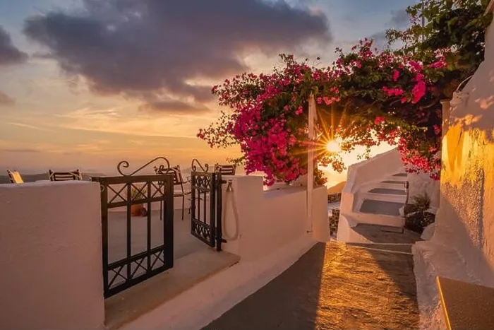 Framed Print : Summer sunset vacation scenic of luxury famous Europe destination. White architecture in Santorini, Greece. Stunning travel scenery with pink flowers Framed Print : Summer sunset vacation scenic of luxury famous Europe destination. White architecture in Santorini, Greece. Stunning travel scenery with pink flowers