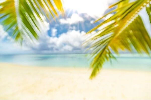 Summer tropical sea with sparkling waves and blue sunny sky, wonderful stunning summer scenery. Beach landscape, amazing blurred view