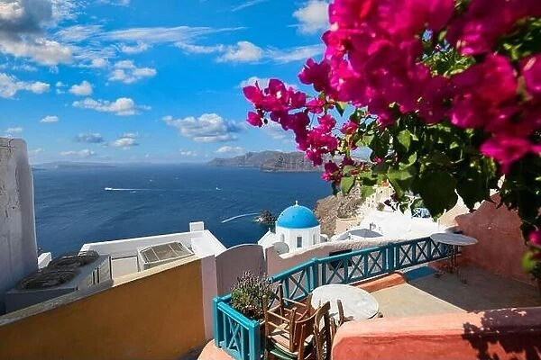 Summer vacation urban scenic of luxury famous destination. White architecture in Santorini, Greece. Perfect travel scenery with terrace sunny blue sky