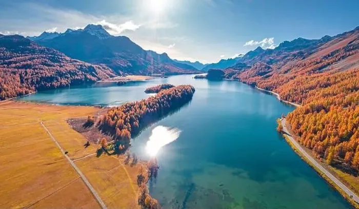 Framed Print : Sun reflected in the calm waterf of Sils lake Framed Print : Sun reflected in the calm waterf of Sils lake
