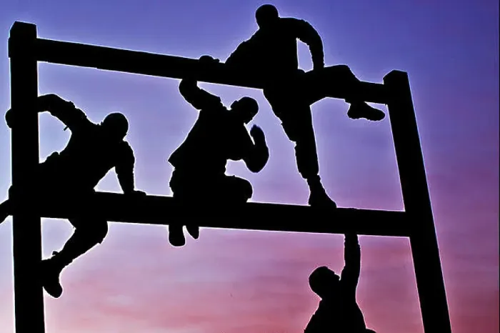 Framed Print : As the sun rises, Soldiers weave through an obstacle course on Camp Taji