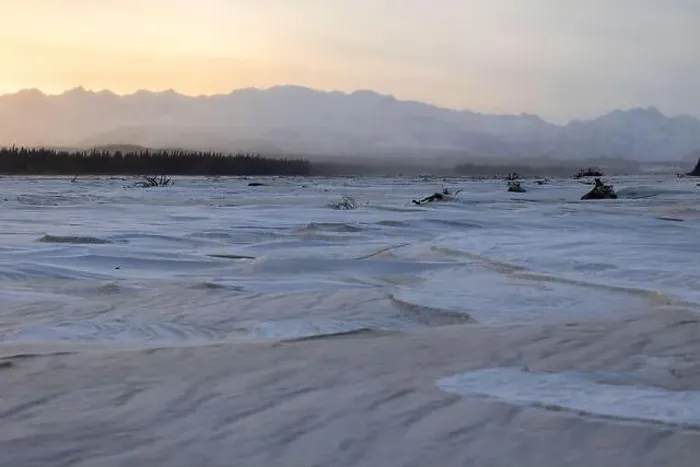 Framed Print : Sun rising over Alaska range behind a frozen river covered in snow along the Alaska Highway on the winter solstice near Framed Print : Sun rising over Alaska range behind a frozen river covered in snow along the Alaska Highway on the winter solstice near