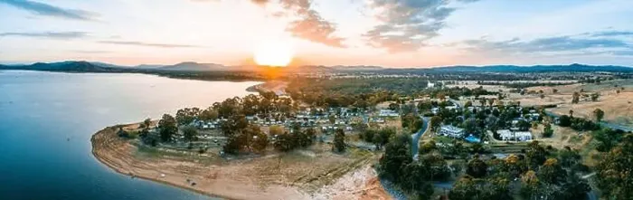 Framed Print : Sun touching the horizon over mountains and Lake Hume Village - wide aerial panorama Framed Print : Sun touching the horizon over mountains and Lake Hume Village - wide aerial panorama