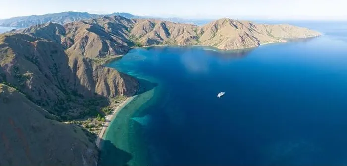 Framed Print : Sunlight illuminates the beautiful coastline of an island near Komodo in Indonesia. This region is known for its spectacular marine biodiversity Framed Print : Sunlight illuminates the beautiful coastline of an island near Komodo in Indonesia. This region is known for its spectacular marine biodiversity