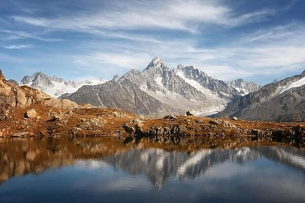 Sunny day on Chesery lake (Lac De Cheserys) in France Alps. Monte Bianco mountain range on background