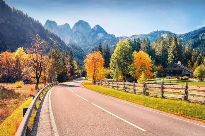 Framed Print : Sunny morning view of Gosaubach lake with asphalt road Framed Print : Sunny morning view of Gosaubach lake with asphalt road