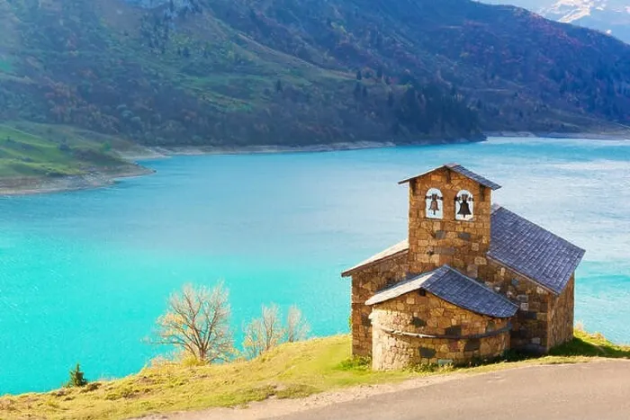 Framed Print : Sunny picturesque view of stone chapel on Roselend lake (Lac de Roselend) in France Alps (Auvergne-Rhone-Alpes). Landscape photography Framed Print : Sunny picturesque view of stone chapel on Roselend lake (Lac de Roselend) in France Alps (Auvergne-Rhone-Alpes). Landscape photography