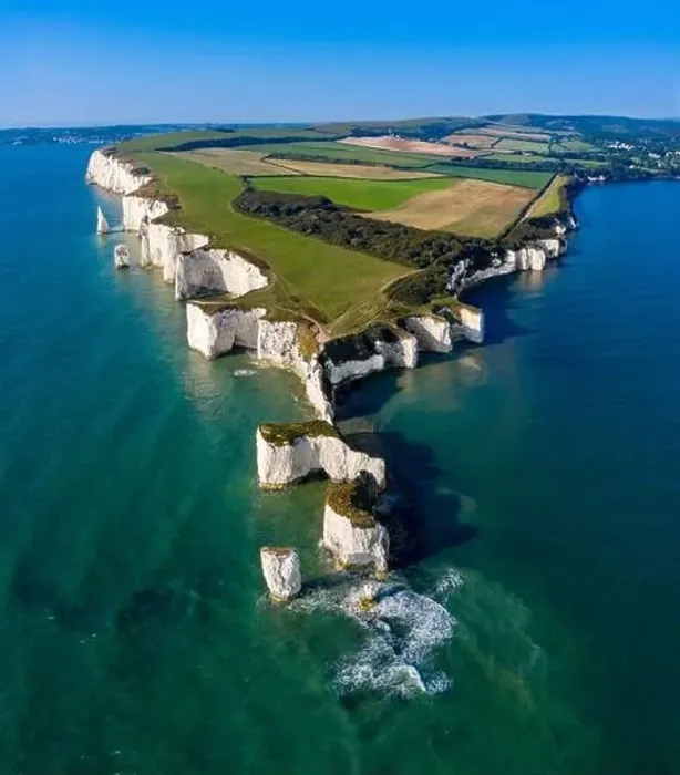 Framed Print : Sunrise catches Old Harry Rocks along the Jurassic Coast. Dorset. Aerial Drone Image Framed Print : Sunrise catches Old Harry Rocks along the Jurassic Coast. Dorset. Aerial Drone Image