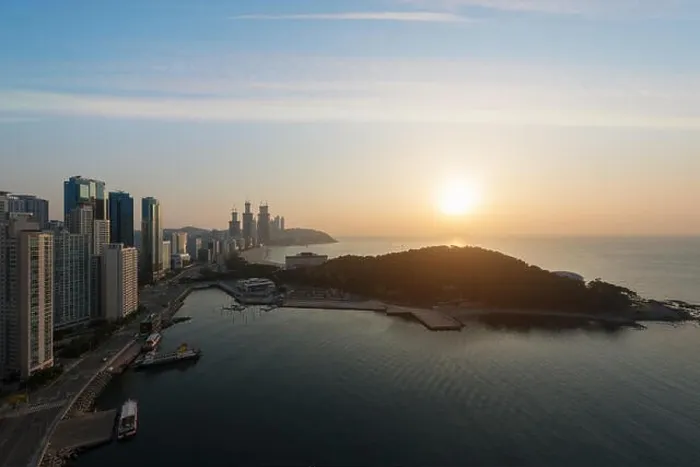 Framed Print : Sunrise at Haeundae beach in Busan. Haeundae beach is Busan's most popular beach in South Korea