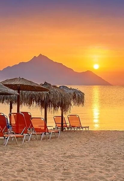 Sunrise at Halkidiki (or Chalkidiki) Beach, Mount Athos in the background, Greece