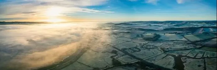 Framed Print : Sunrise over Marshland and River Exe in fog, RSPB Exminster and Powderham Marshe from a drone, Exeter, Devon, England Framed Print : Sunrise over Marshland and River Exe in fog, RSPB Exminster and Powderham Marshe from a drone, Exeter, Devon, England