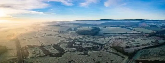Framed Print : Sunrise over Marshland and River Exe in fog, RSPB Exminster and Powderham Marshe from a drone, Exeter, Devon, England Framed Print : Sunrise over Marshland and River Exe in fog, RSPB Exminster and Powderham Marshe from a drone, Exeter, Devon, England