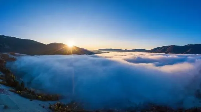 Framed Print : Sunrise over mountain hils covered with gray mist. Aerial panoramic drone shot Framed Print : Sunrise over mountain hils covered with gray mist. Aerial panoramic drone shot
