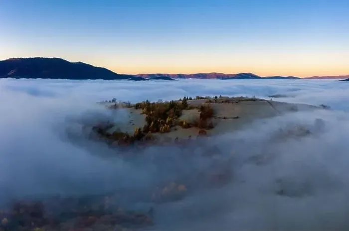 Framed Print : Sunrise over mountain hils covered with gray mist. Aerial panoramic drone shot Framed Print : Sunrise over mountain hils covered with gray mist. Aerial panoramic drone shot