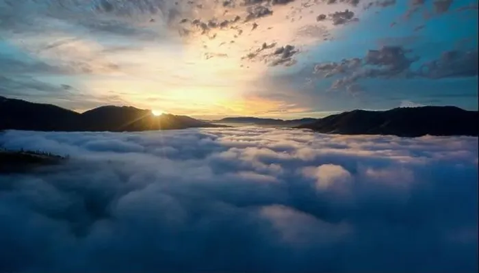 Framed Print : Sunrise over mountain hils covered with gray mist. Aerial panoramic drone shot Framed Print : Sunrise over mountain hils covered with gray mist. Aerial panoramic drone shot