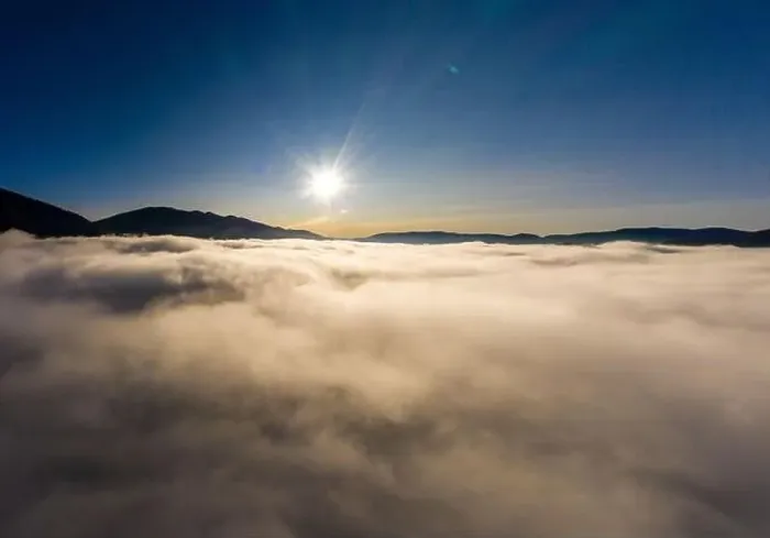 Framed Print : Sunrise over mountain hils covered with gray mist. Aerial panoramic drone shot Framed Print : Sunrise over mountain hils covered with gray mist. Aerial panoramic drone shot