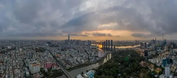 Framed Print : Sunrise panorama of Ho Chi Minh City and Saigon River including all key buildings with beautiful sky Framed Print : Sunrise panorama of Ho Chi Minh City and Saigon River including all key buildings with beautiful sky