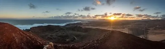 Framed Print : sunrise panorama view from volcano on ocean coast and village on lanzarote Framed Print : sunrise panorama view from volcano on ocean coast and village on lanzarote