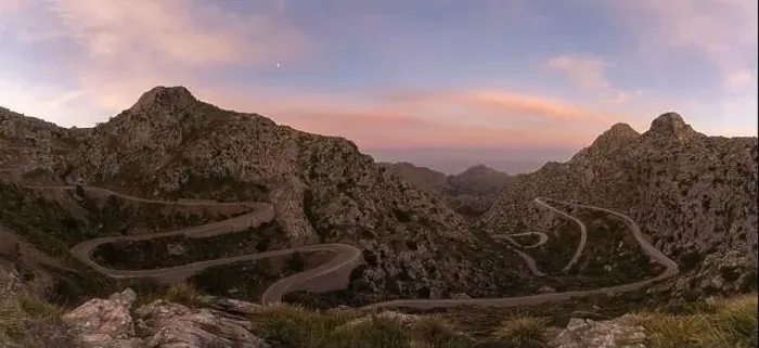 Framed Print : Sunrise in the Tramuntana mountains of Mallorca with a view of the landmark snake road leading down to Sa Calobra Framed Print : Sunrise in the Tramuntana mountains of Mallorca with a view of the landmark snake road leading down to Sa Calobra