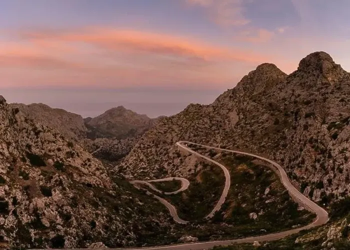 Framed Print : Sunrise in the Tramuntana mountains of Mallorca with a view of the landmark snake road leading down to Sa Calobra Framed Print : Sunrise in the Tramuntana mountains of Mallorca with a view of the landmark snake road leading down to Sa Calobra