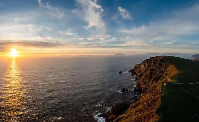 Framed Print : sunset over the Atlantic Ocean and the cliffs of Bray Head on Valentia Island in County Kerry of western Ireland Framed Print : sunset over the Atlantic Ocean and the cliffs of Bray Head on Valentia Island in County Kerry of western Ireland