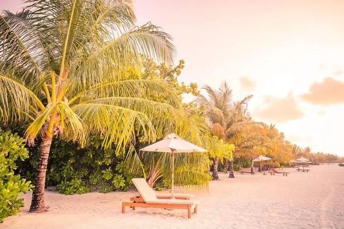 Framed Print : Sunset beach landscape, couple travel honeymoon destination. Luxury holiday summer vacation tropical island view close to sea. Loungers umbrella chair Framed Print : Sunset beach landscape, couple travel honeymoon destination. Luxury holiday summer vacation tropical island view close to sea. Loungers umbrella chair