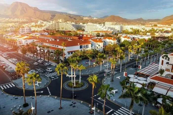 Framed Print : sunset cityscape of Playa de las Americas holiday resort streets in Tenerife. Canary islands, Spain Framed Print : sunset cityscape of Playa de las Americas holiday resort streets in Tenerife. Canary islands, Spain