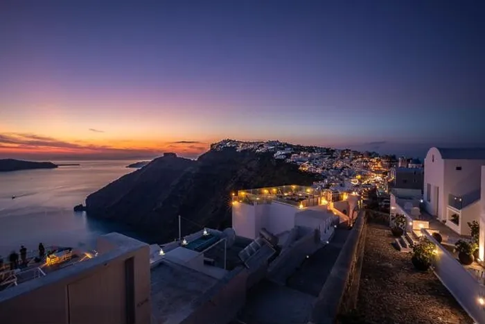 Framed Print : Sunset on the famous Greek resort Fira, Greece, Europe. Traveling concept background. Romantic Santorini island during sunset, amazing view, lights Framed Print : Sunset on the famous Greek resort Fira, Greece, Europe. Traveling concept background. Romantic Santorini island during sunset, amazing view, lights