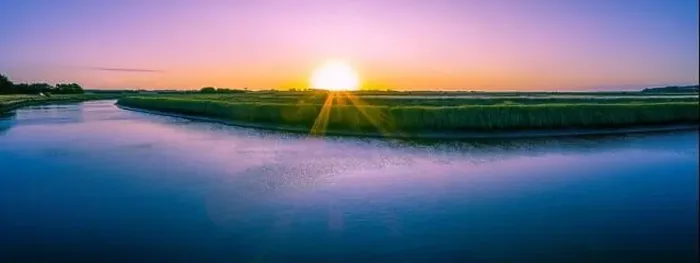 Framed Print : Sunset over land and river - wide aerial panorama Framed Print : Sunset over land and river - wide aerial panorama