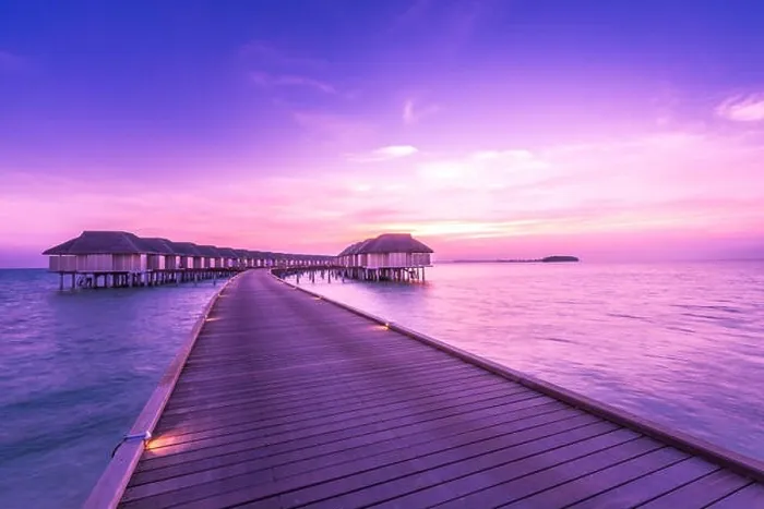 Framed Print : Sunset landscape on Maldives island beach, water villas resort. Beautiful sky and clouds Framed Print : Sunset landscape on Maldives island beach, water villas resort. Beautiful sky and clouds