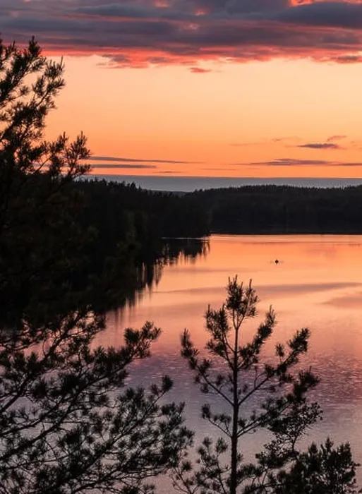 Framed Print : Sunset landscape with peaceful lake and row boat at summer night in Finland Framed Print : Sunset landscape with peaceful lake and row boat at summer night in Finland